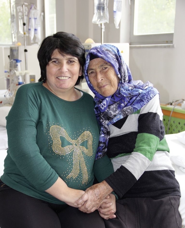 Mother and daughter in dialysis centre